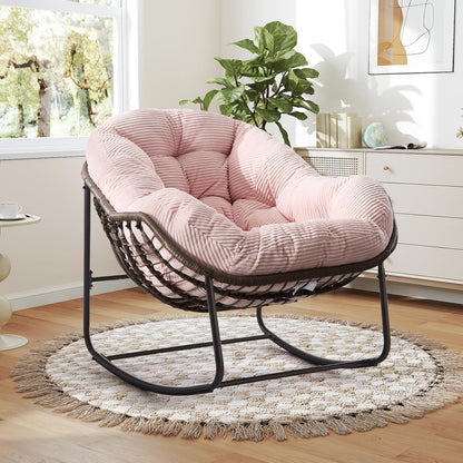 Your Personal Sanctuary: A Plush Rocking Papasan for Quiet Afternoons and Turning Pages.