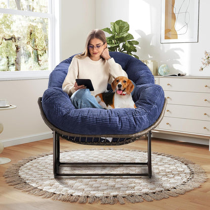 Your Personal Sanctuary: A Plush Rocking Papasan for Quiet Afternoons and Turning Pages.