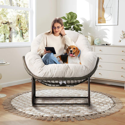 Your Personal Sanctuary: A Plush Rocking Papasan for Quiet Afternoons and Turning Pages.