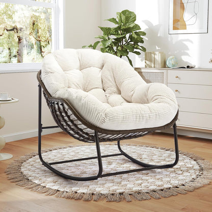 Your Personal Sanctuary: A Plush Rocking Papasan for Quiet Afternoons and Turning Pages.