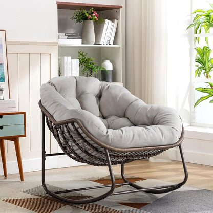 Your Personal Sanctuary: A Plush Rocking Papasan for Quiet Afternoons and Turning Pages.